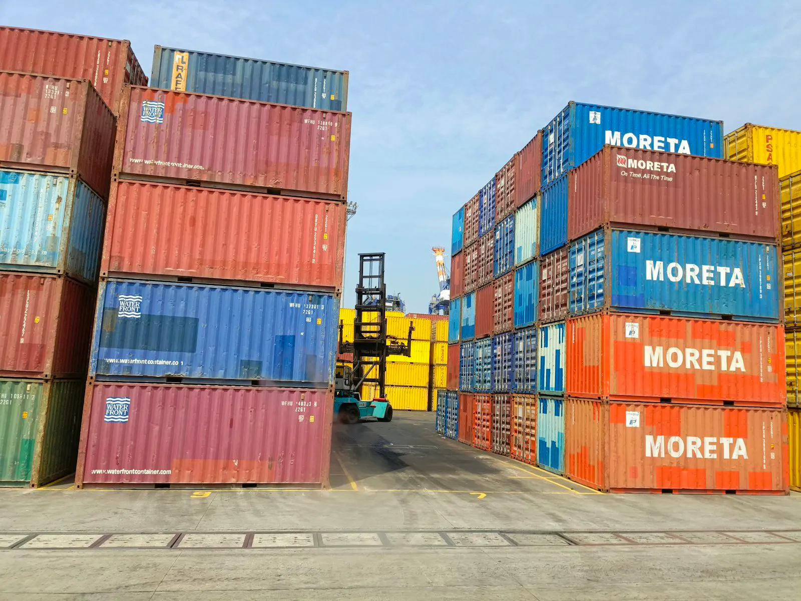 Industrial container yard with stacked boxes