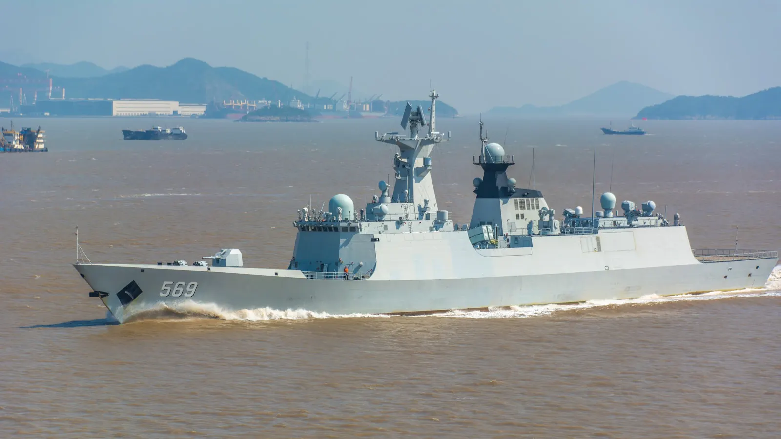Grey naval warship at sea