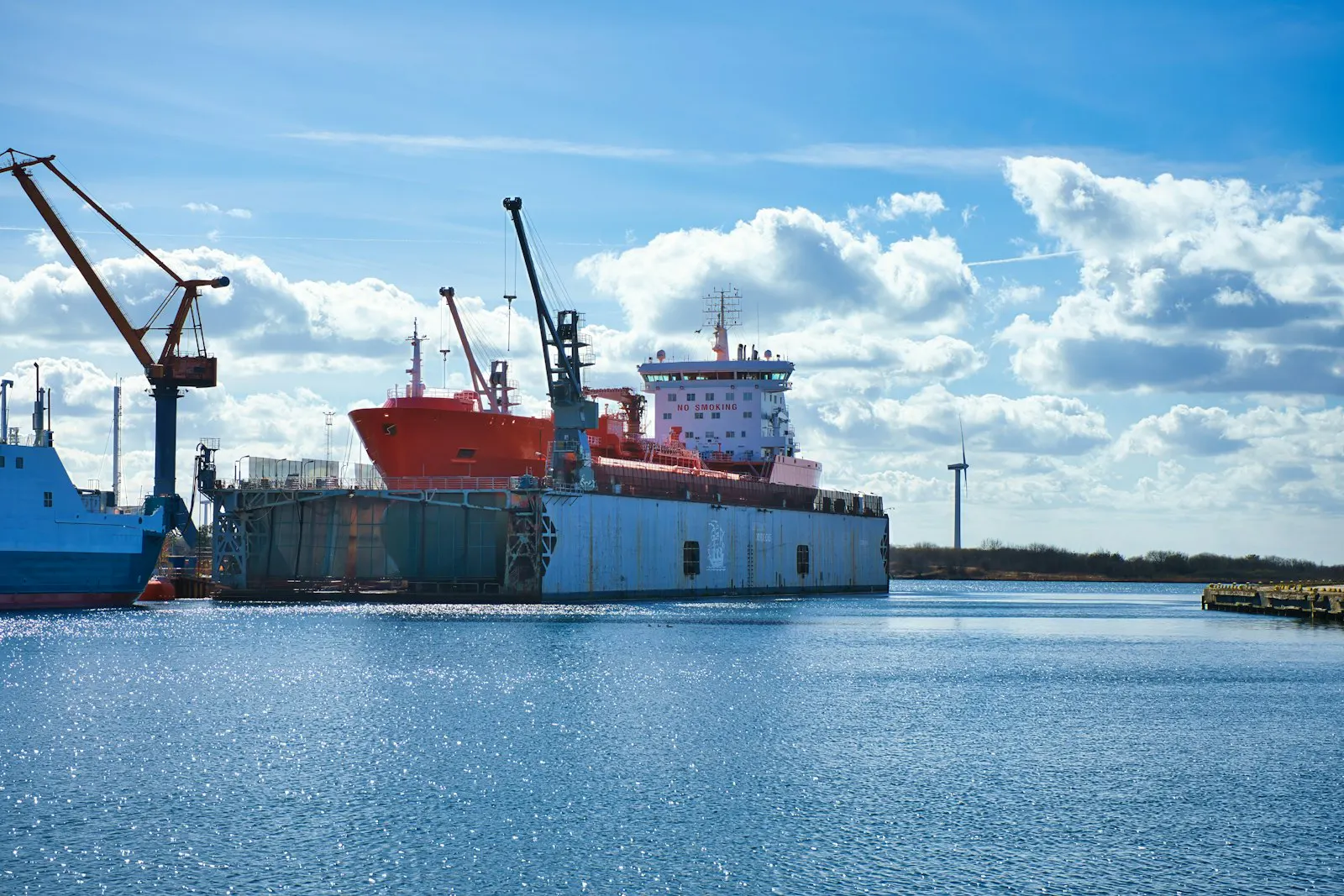 Frigate under construction at a shipyard