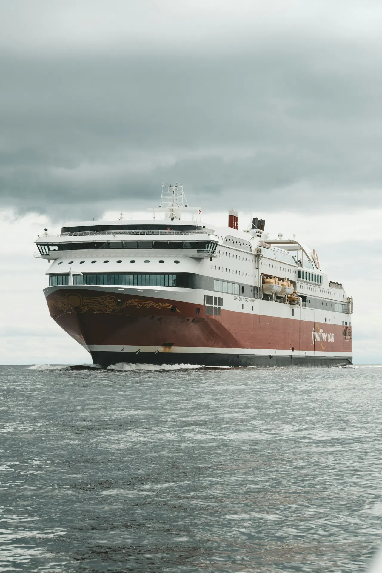 Modern LNG-hybrid ferry design rendering at sea