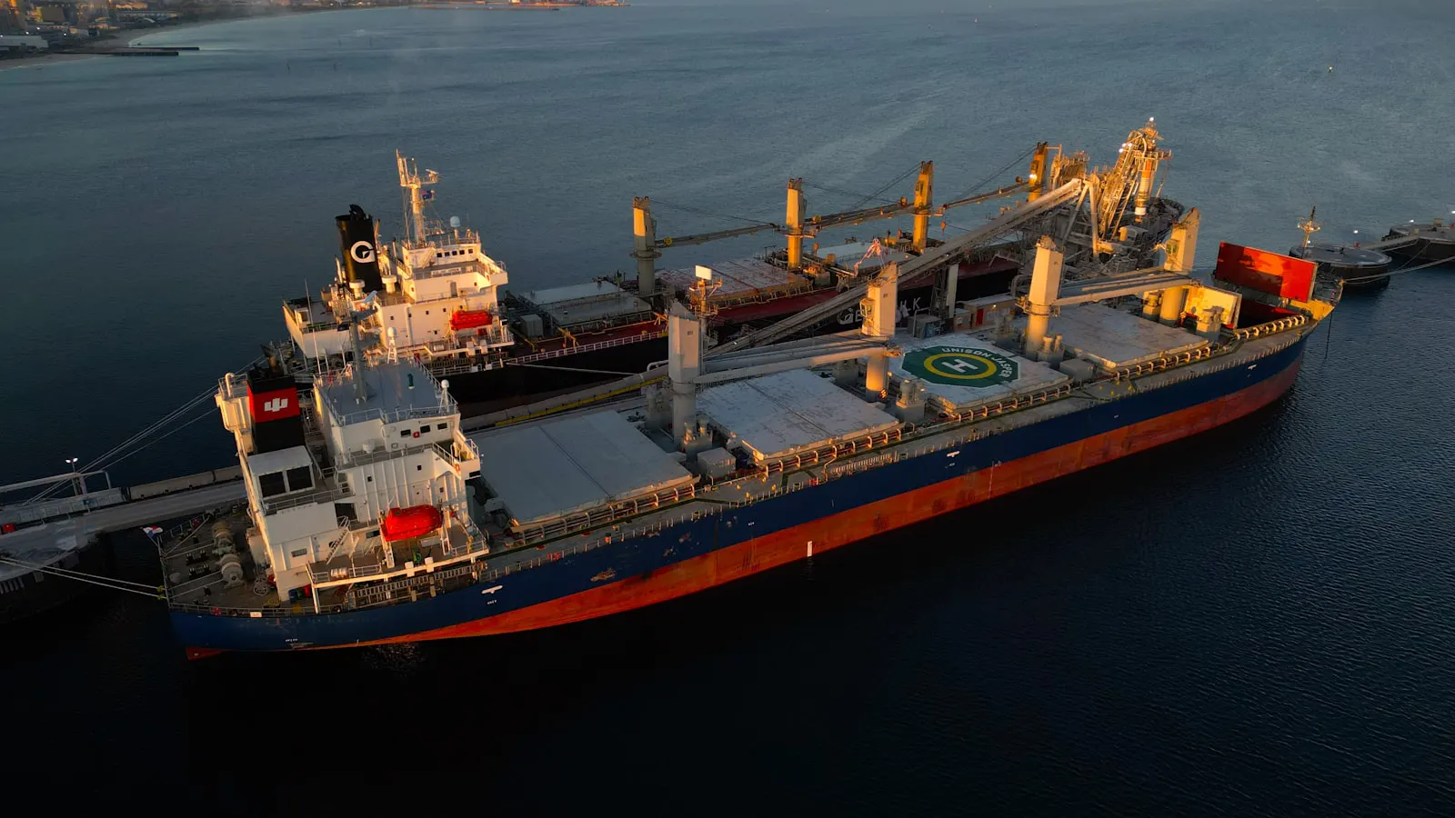 Aerial view of a bulk carrier at port